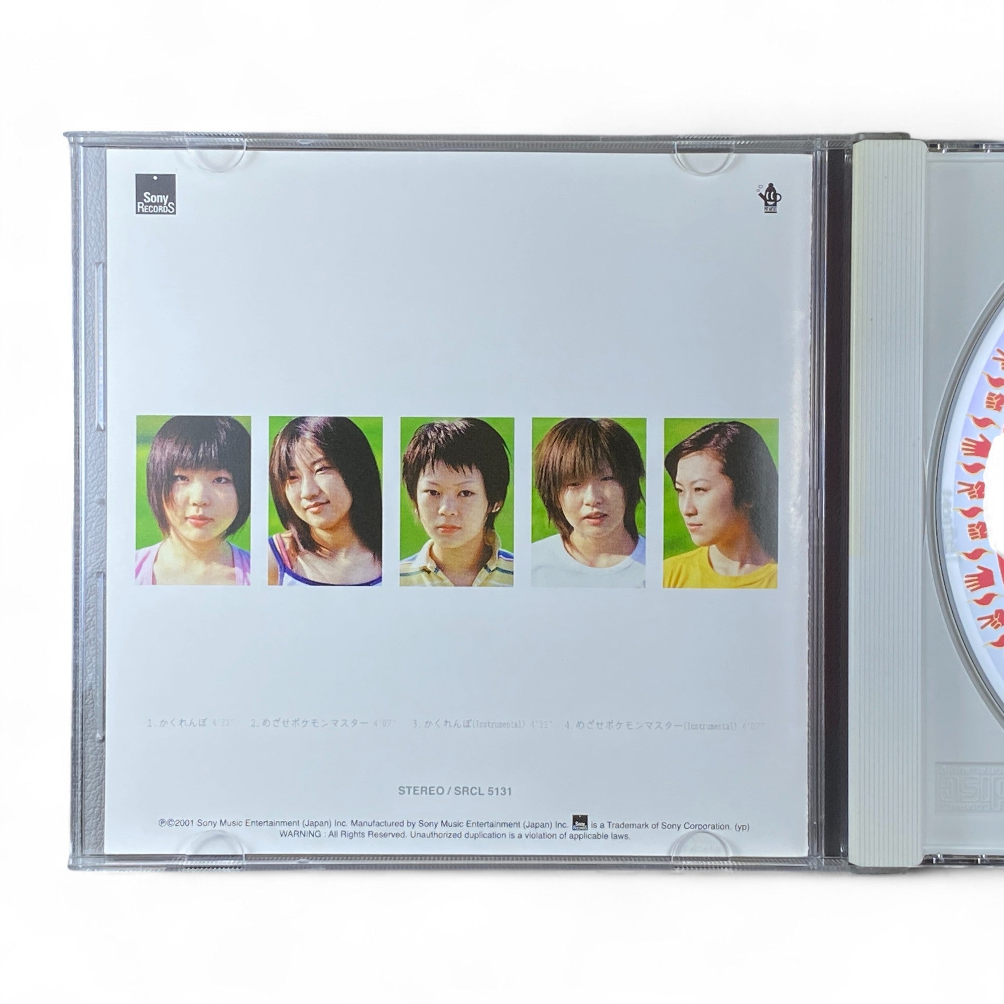 Pokémon music CD cover with children and Pokémon theme songs