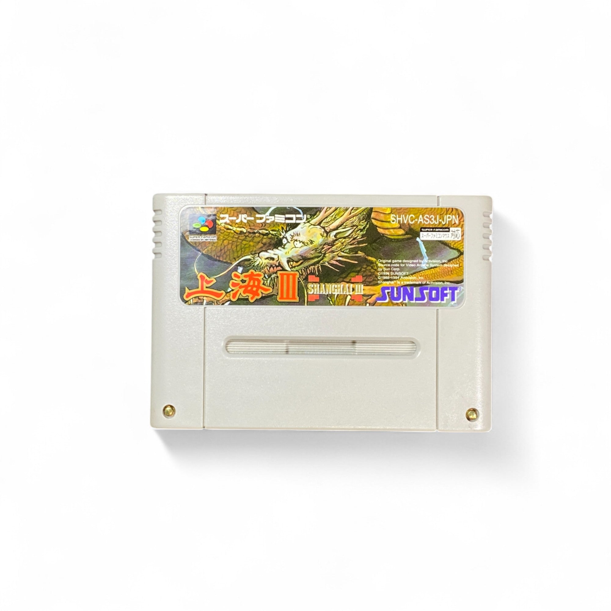 Shanghai III Super Famicom box art with dragon illustration and mahjong theme