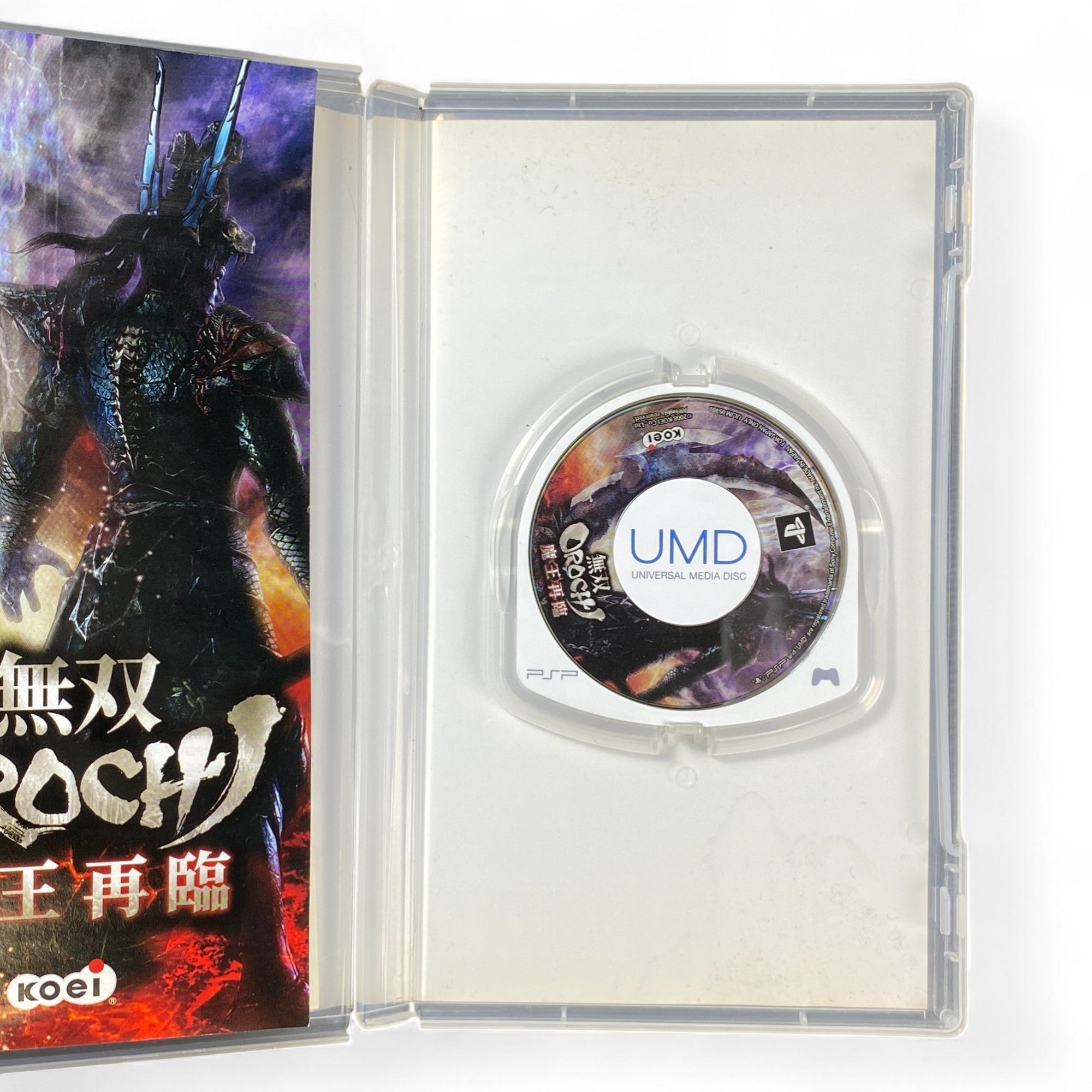 PSP game cover of Musou Orochi Maou Sairin showing dark armored character with glowing background