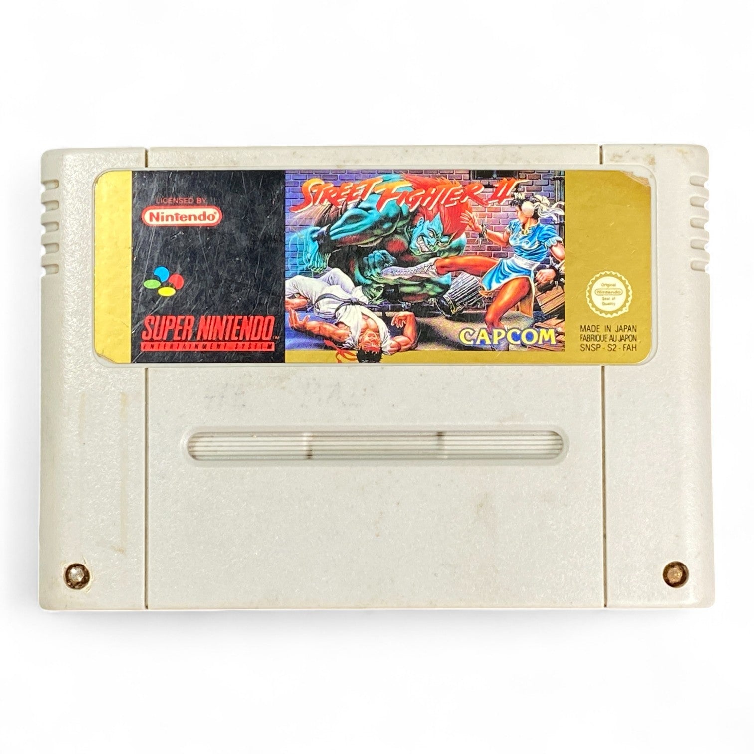 Street Fighter II Turbo SNES cartridge with Capcom label and classic artwork

